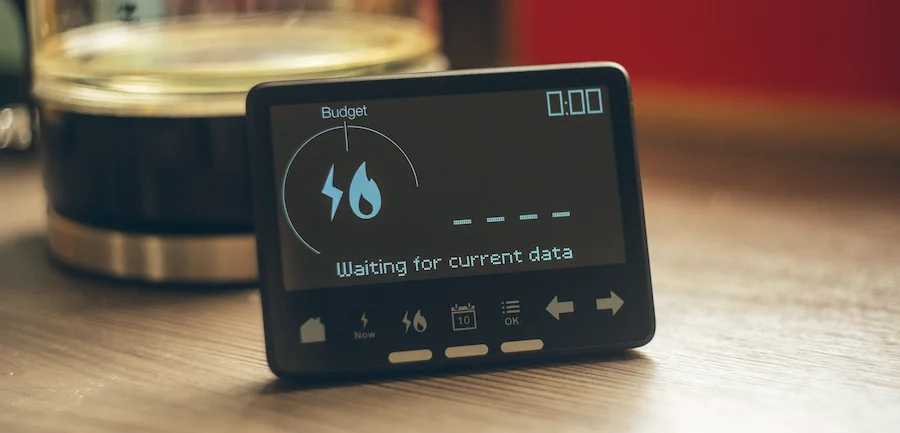 An in-home energy display showing electricity and gas indicators