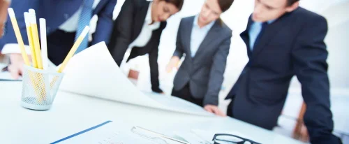 A team working together on business plans